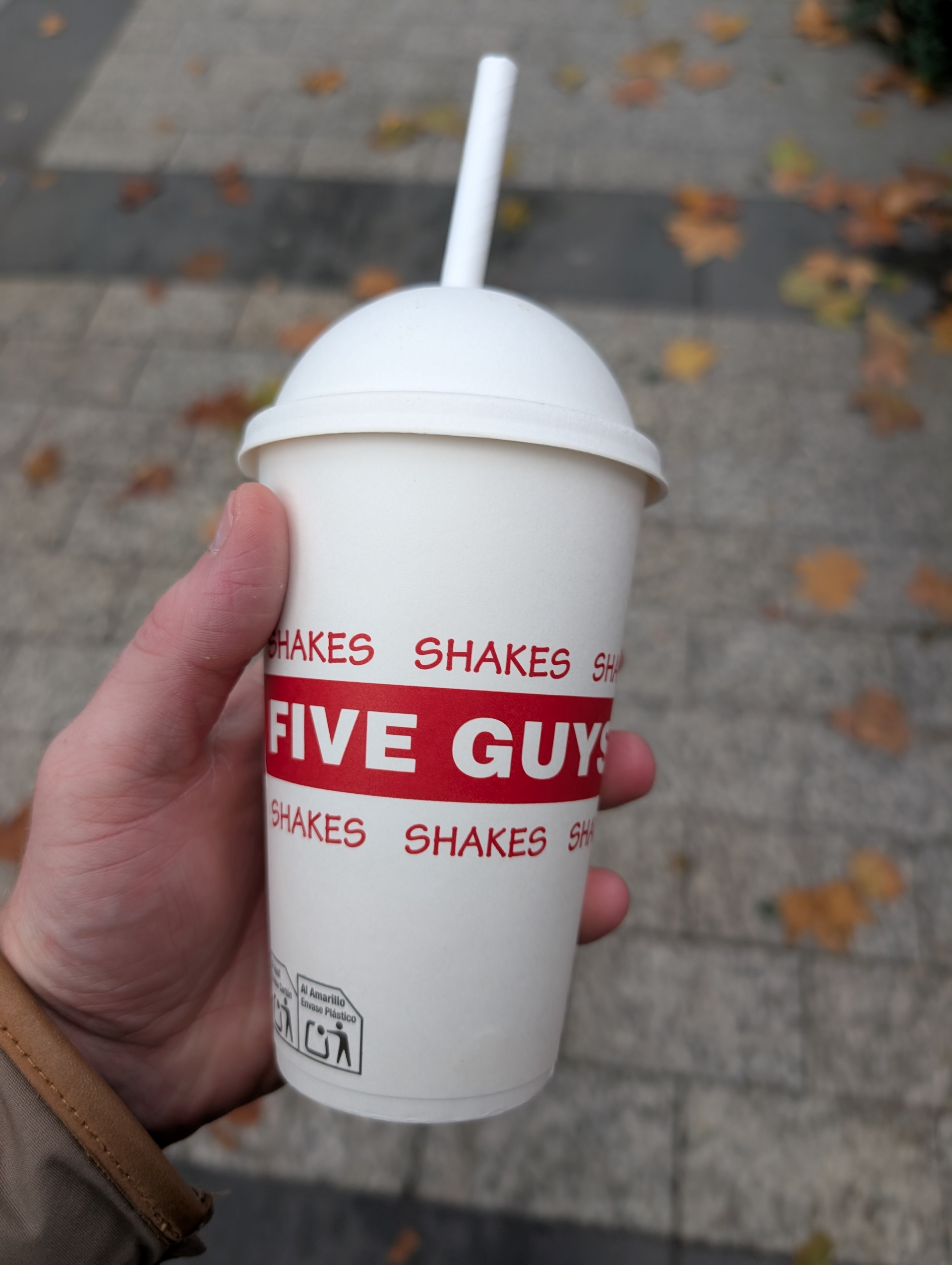 It was strawberry flavoured with whipped cream Five guys milkshake